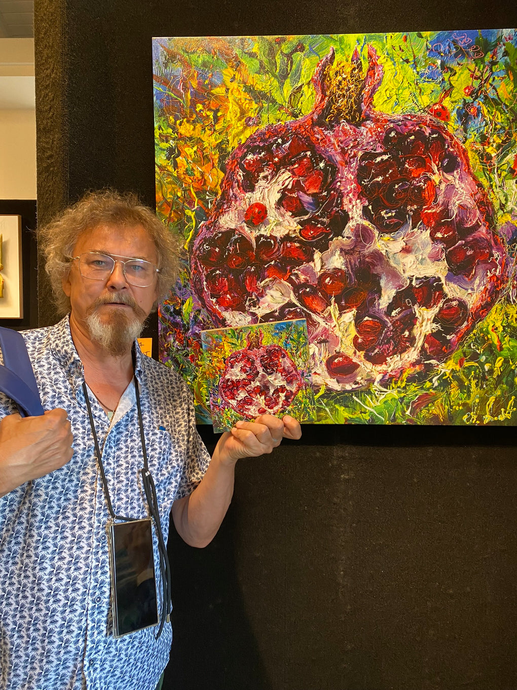 Artist Alexi Antonov painting pomegranate